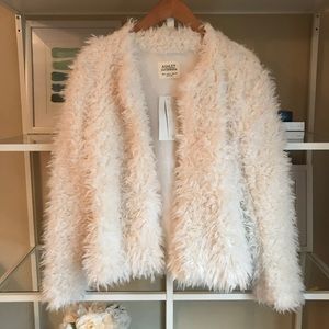 White faux fur coat